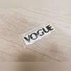 Эмблема на крышку багажника "VOGUE"