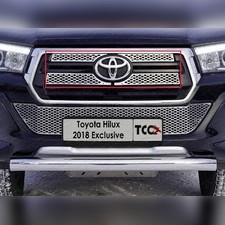 Накладка на решетку радиатора, верхняя (лист) Toyota Hilux 2020-нв