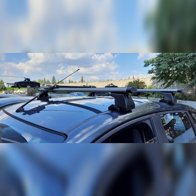 Багажник на крышу с аэродинамическими поперечинами Renault Kangoo 2008-нв "Аэро" (в штатные места)