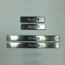 Накладки на пороги с логотипом и LED подсветкой Hyundai Solaris 2010 -2016