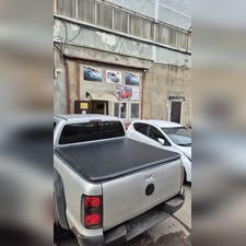 Крышка кузова виниловая Volkswagen Amarok 2010-нв (трехсекционная)