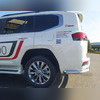 Защита заднего бампера "угловая" Toyota Land Cruiser 300 2021-нв (Юбилейная)