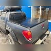 Крышка кузова трехсекционная Mitsubishi L200 2015-нв (алюминиевая, глянцевая) на борта